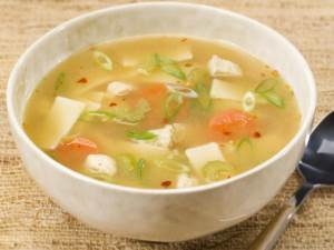 asian chicken noodle soup in bowl