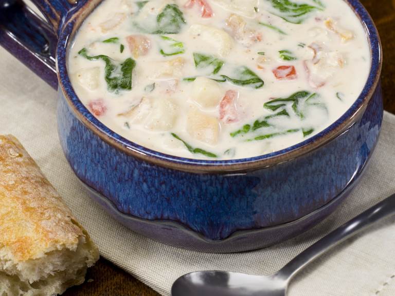 Spicy Cajun Clam greens Soup in bowl